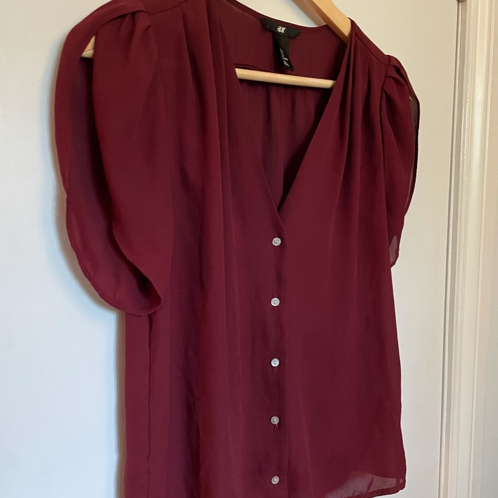 Beautiful sheer H & M short sleeve blouse in red wine colour